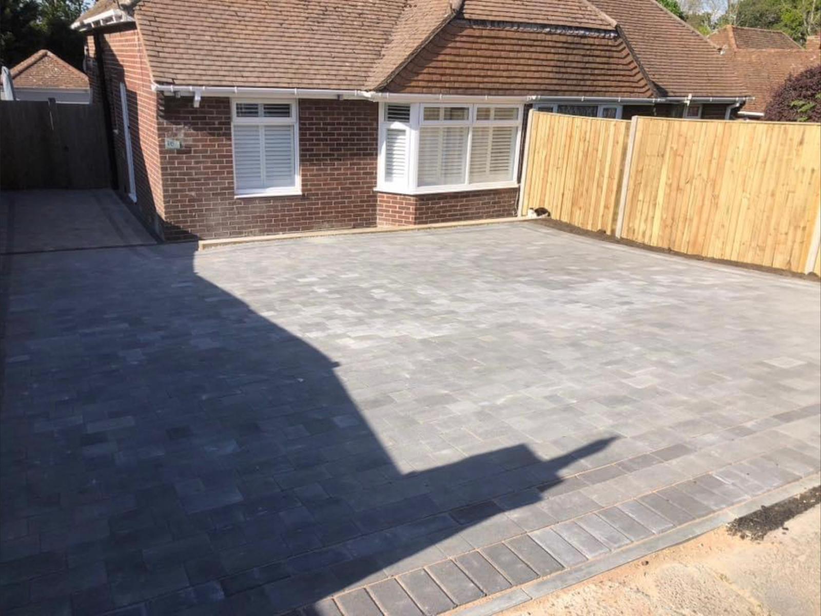 New block paving driveway outside a bungalow