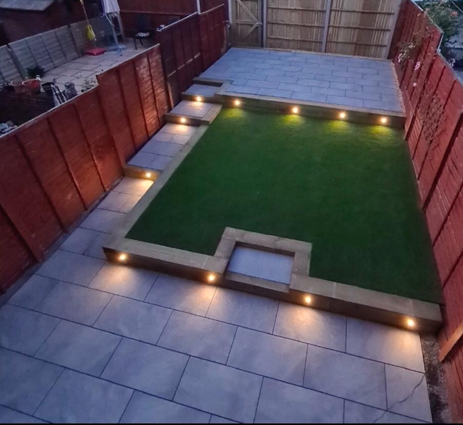 Raised garden patio with pathway lighting