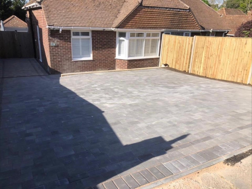 New block paving driveway outside a bungalow