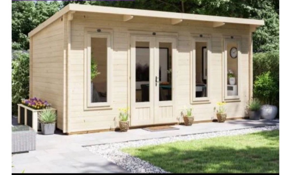 Timber garden room with double doors and patio frontage